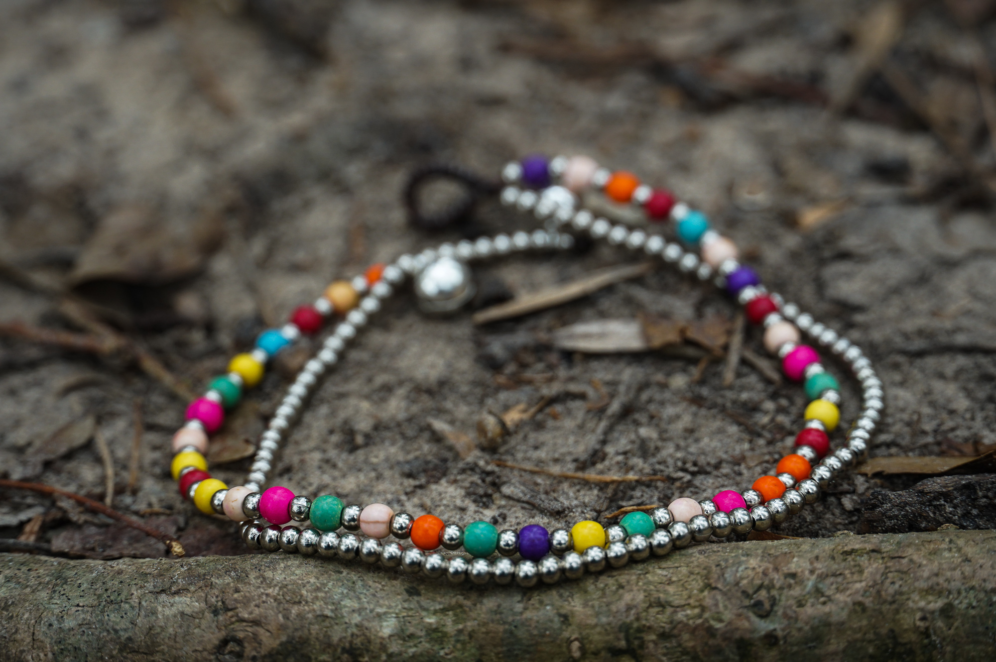 Fancy Dual Band Boho Silver Anklet featuring silver bells and pressed cotton chords, handcrafted by Thai artisans.