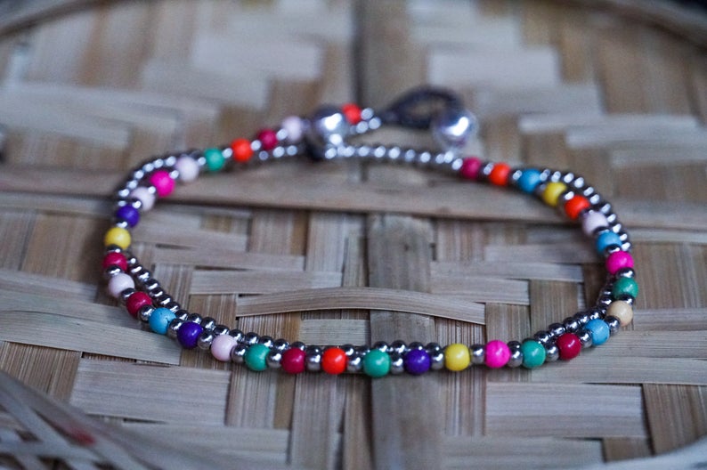 Fancy Dual Band Boho Silver Anklet featuring silver bells and pressed cotton chords, handcrafted by Thai artisans.