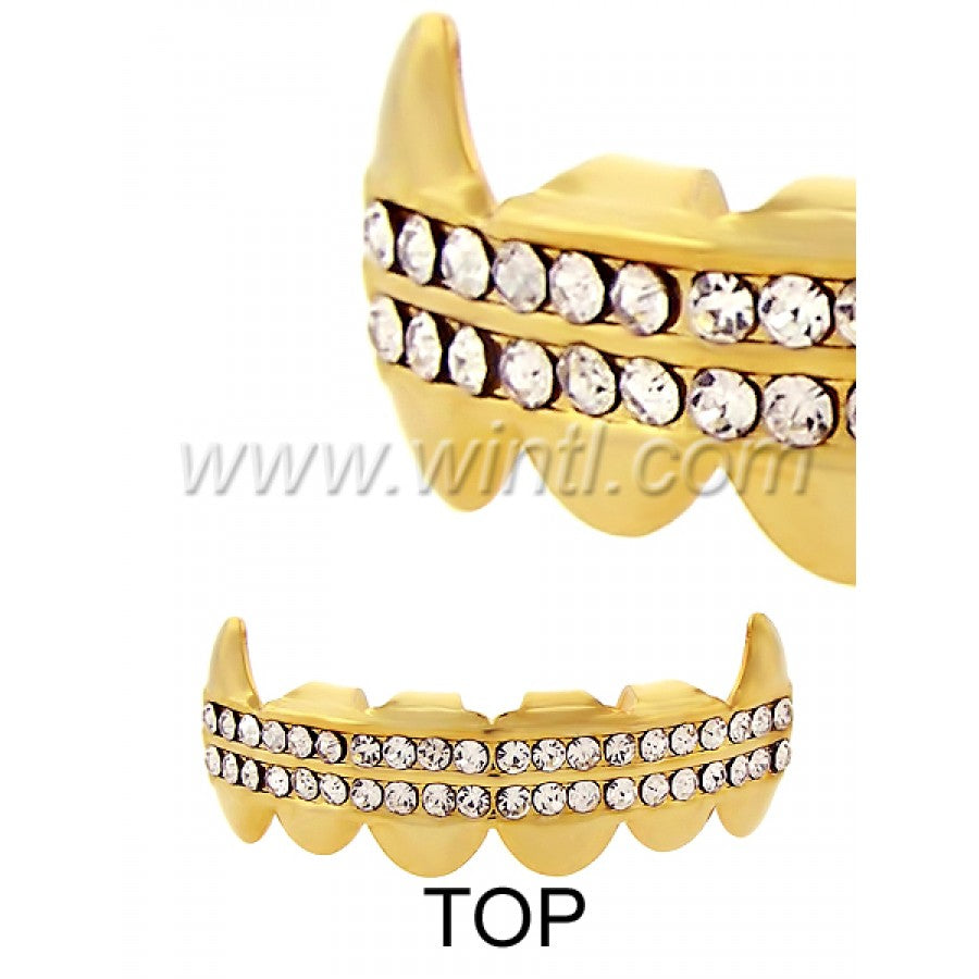 Hip Hop Iced Out Fangs Grillz in Rhodium and Gold plating, displayed in an acrylic box with wax/mold for fitting.