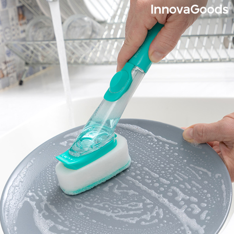 Person scrubbing plate with brush.