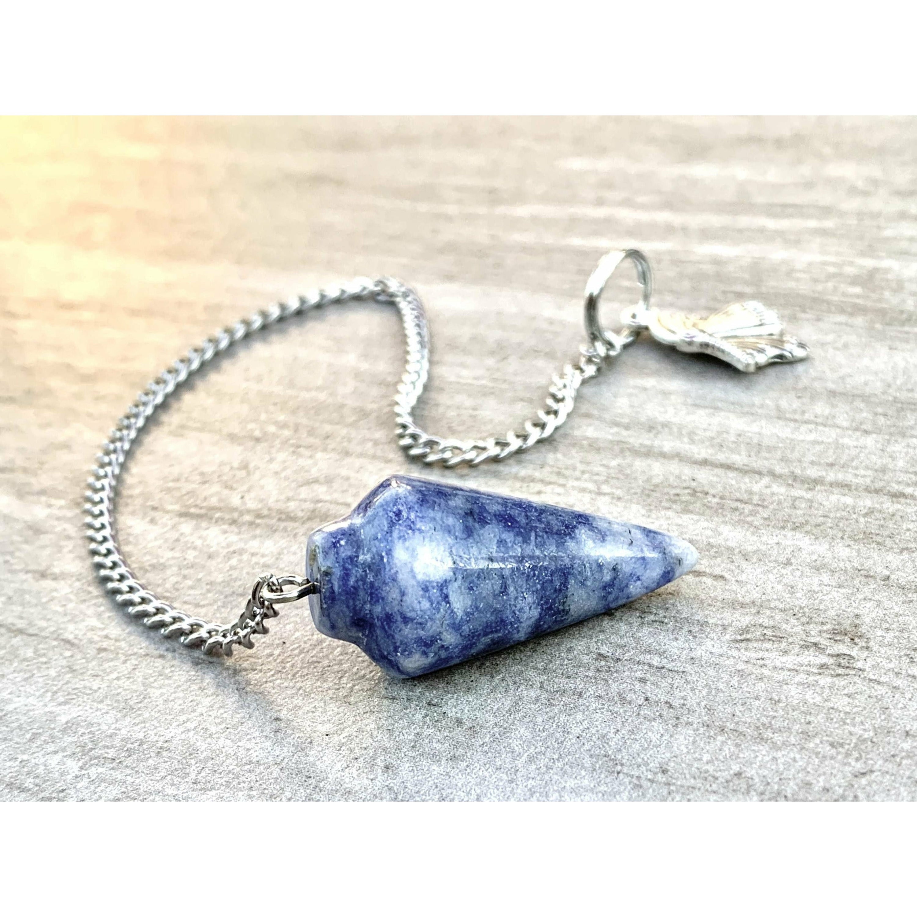 A beautiful Sodalite Pendulum Bracelet featuring polished blue sodalite stones, adjustable for comfort.