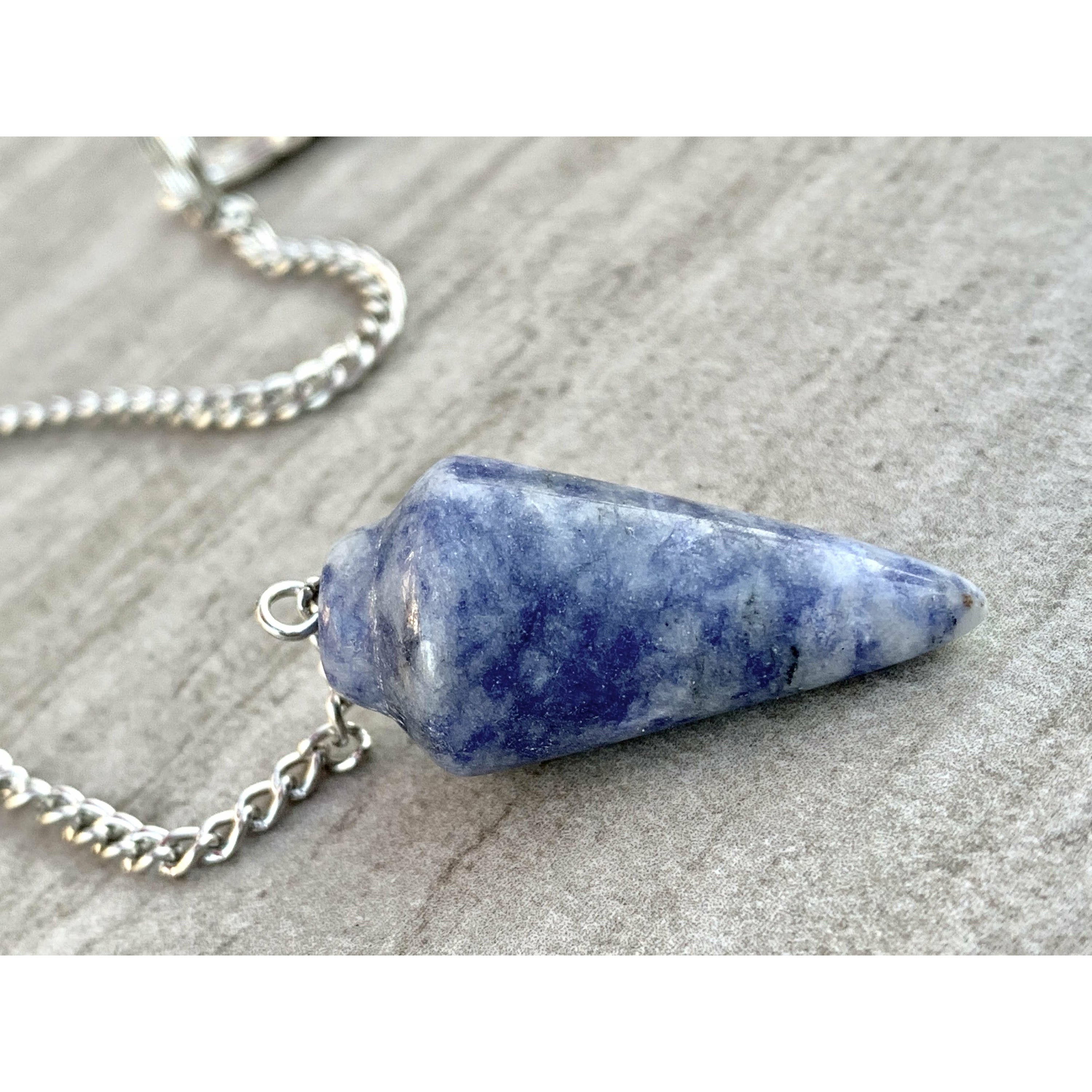 A beautiful Sodalite Pendulum Bracelet featuring polished blue sodalite stones, adjustable for comfort.