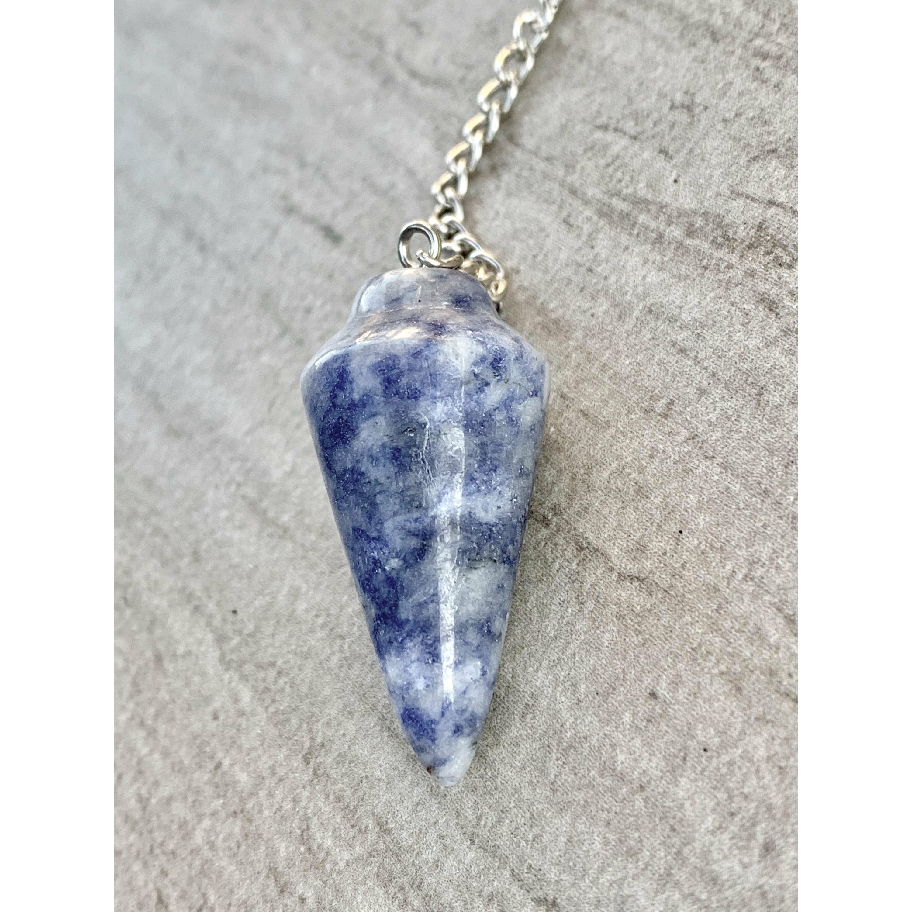 A beautiful Sodalite Pendulum Bracelet featuring polished blue sodalite stones, adjustable for comfort.