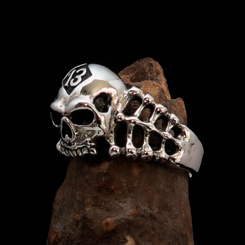 Antiqued Men's Number 13 Skull and Bones Ring made of sterling silver, featuring a unique skull design with an antiqued finish.