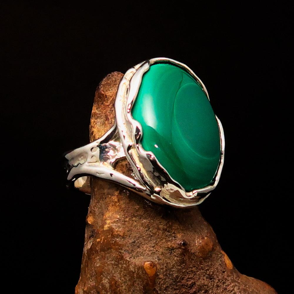 Sterling Silver Ring featuring an oval Green Malachite gemstone, size 10.5, polished finish.