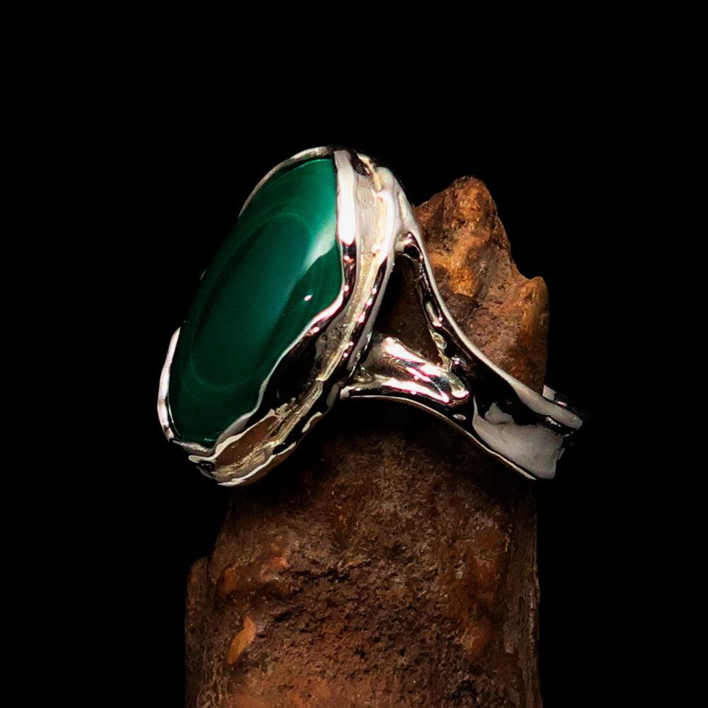 Sterling Silver Ring featuring an oval Green Malachite gemstone, size 10.5, polished finish.