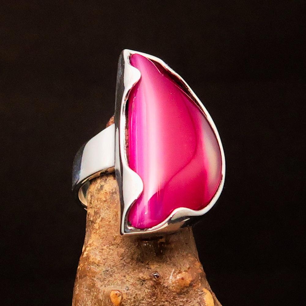 Asymmetric Sterling Silver Ring featuring a fancy shaped pink Agate Cabochon, showcasing its unique design and polished finish.