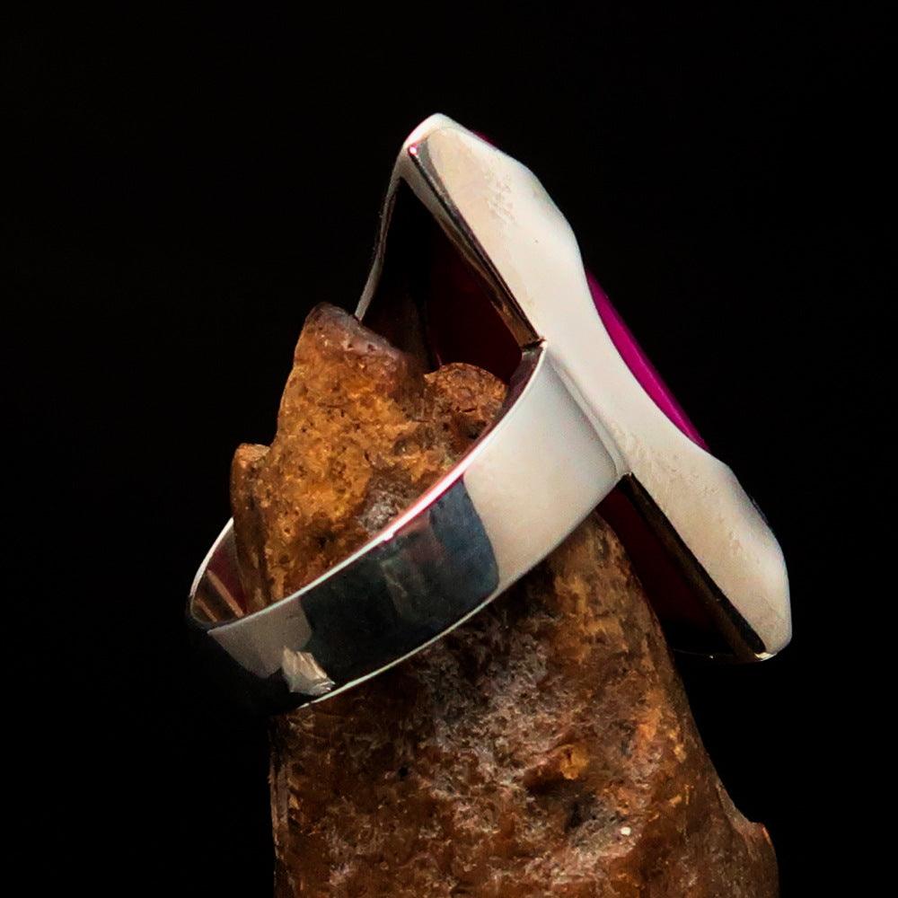 Asymmetric Sterling Silver Ring featuring a fancy shaped pink Agate Cabochon, showcasing its unique design and polished finish.