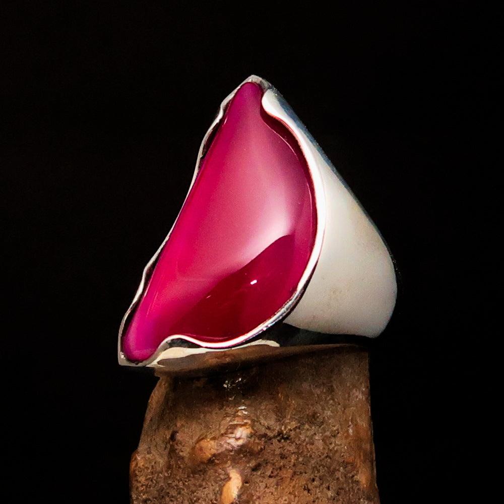 Asymmetric Sterling Silver Ring featuring a fancy shaped pink Agate Cabochon, showcasing its unique design and polished finish.