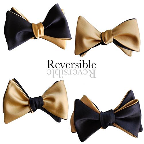 A stylish Black & Gold Butterfly Bow Tie displayed elegantly, showcasing its luxurious fabric and classic design.