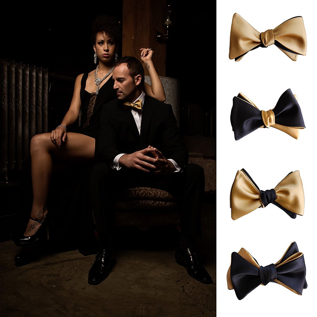 A stylish Black & Gold Butterfly Bow Tie displayed elegantly, showcasing its luxurious fabric and classic design.