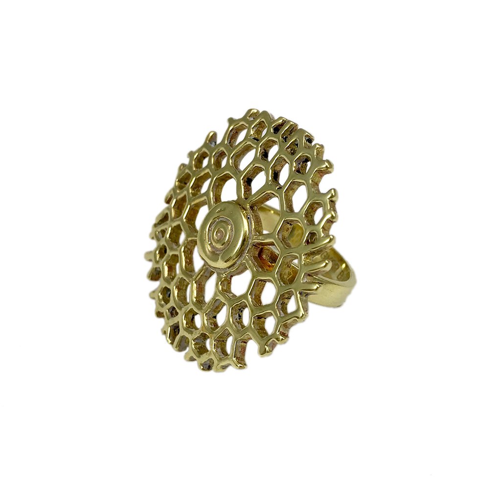 Gold ring with honeycomb design.