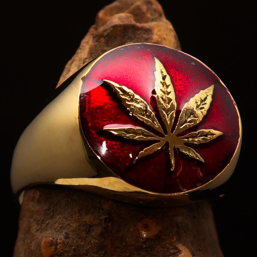 Brass Marihuana Leaf Men's Ring featuring a high-polished finish and vibrant red enamel, showcasing a unique leaf design.