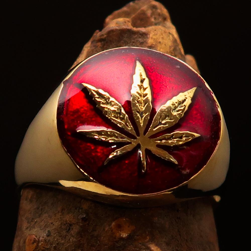 Brass Marihuana Leaf Men's Ring featuring a high-polished finish and vibrant red enamel, showcasing a unique leaf design.