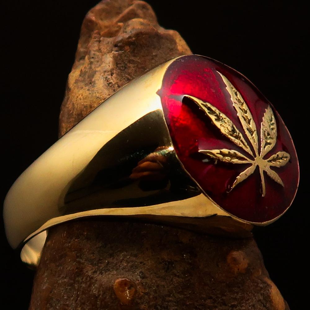 Brass Marihuana Leaf Men's Ring featuring a high-polished finish and vibrant red enamel, showcasing a unique leaf design.