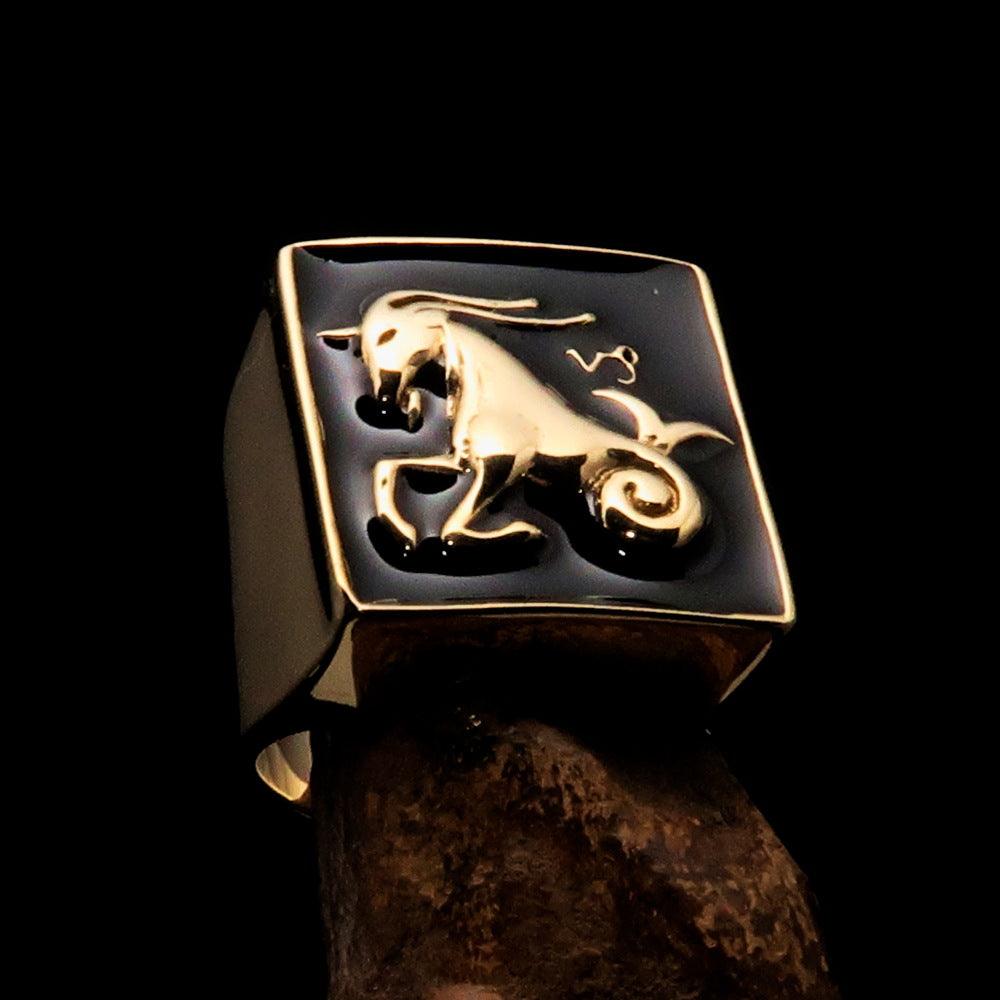 Brass Men's Zodiac Ring featuring Capricorn symbol with a polished black enamel finish, showcasing its elegant design.