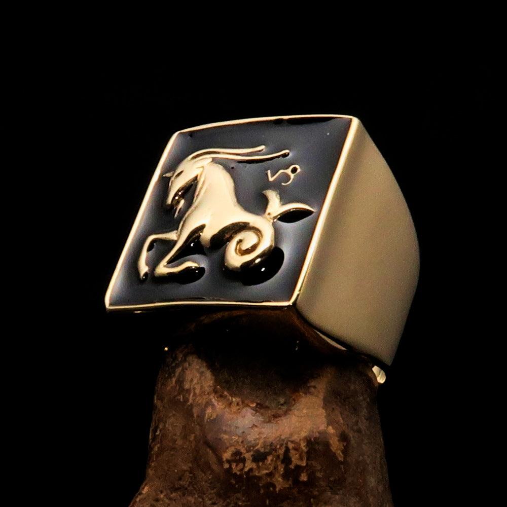 Brass Men's Zodiac Ring featuring Capricorn symbol with a polished black enamel finish, showcasing its elegant design.