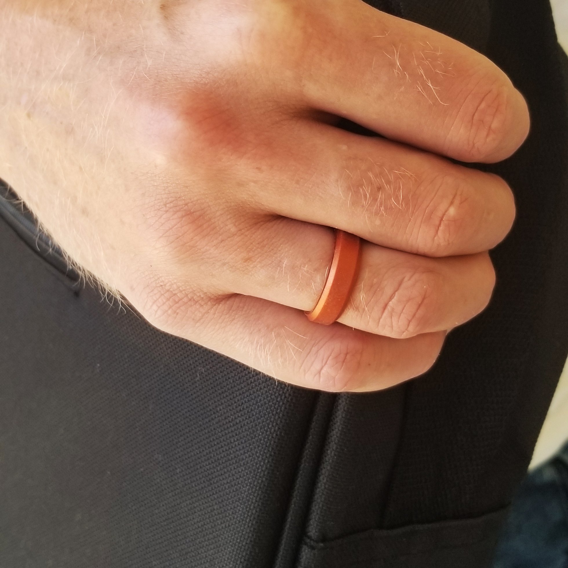 Copper Bevel Edge Breathable Silicone Ring for Men, showcasing its sleek design and comfortable fit.