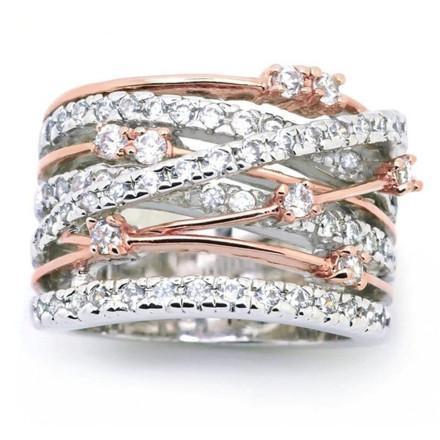 Elegant Crystal Crossover Ring in silver and rose gold tones, featuring sparkling crystals and a unique crossover design.