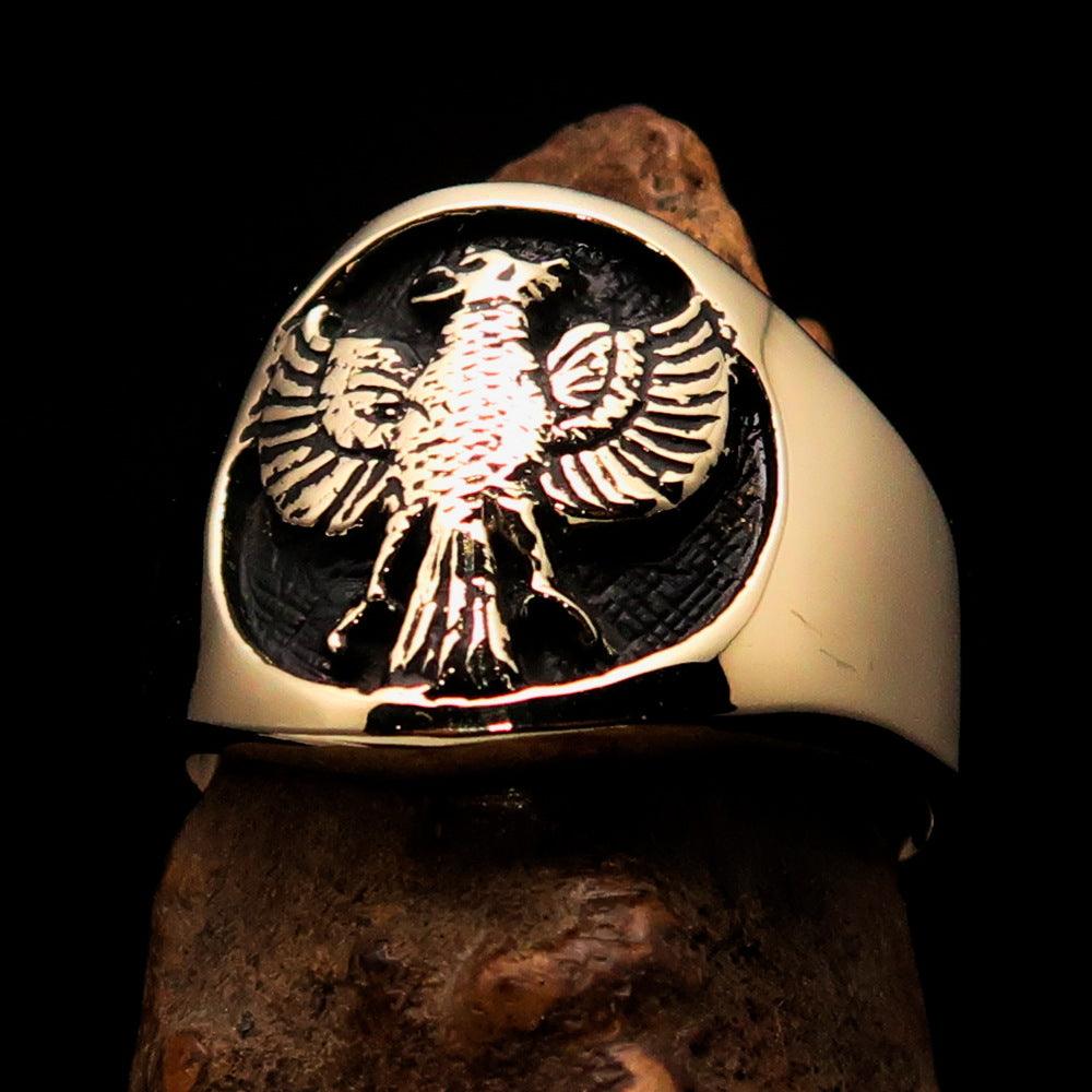 Men's Black Garuda Ring made of solid brass with high polish finish and intricate enamel detailing, showcasing a powerful ancient design.