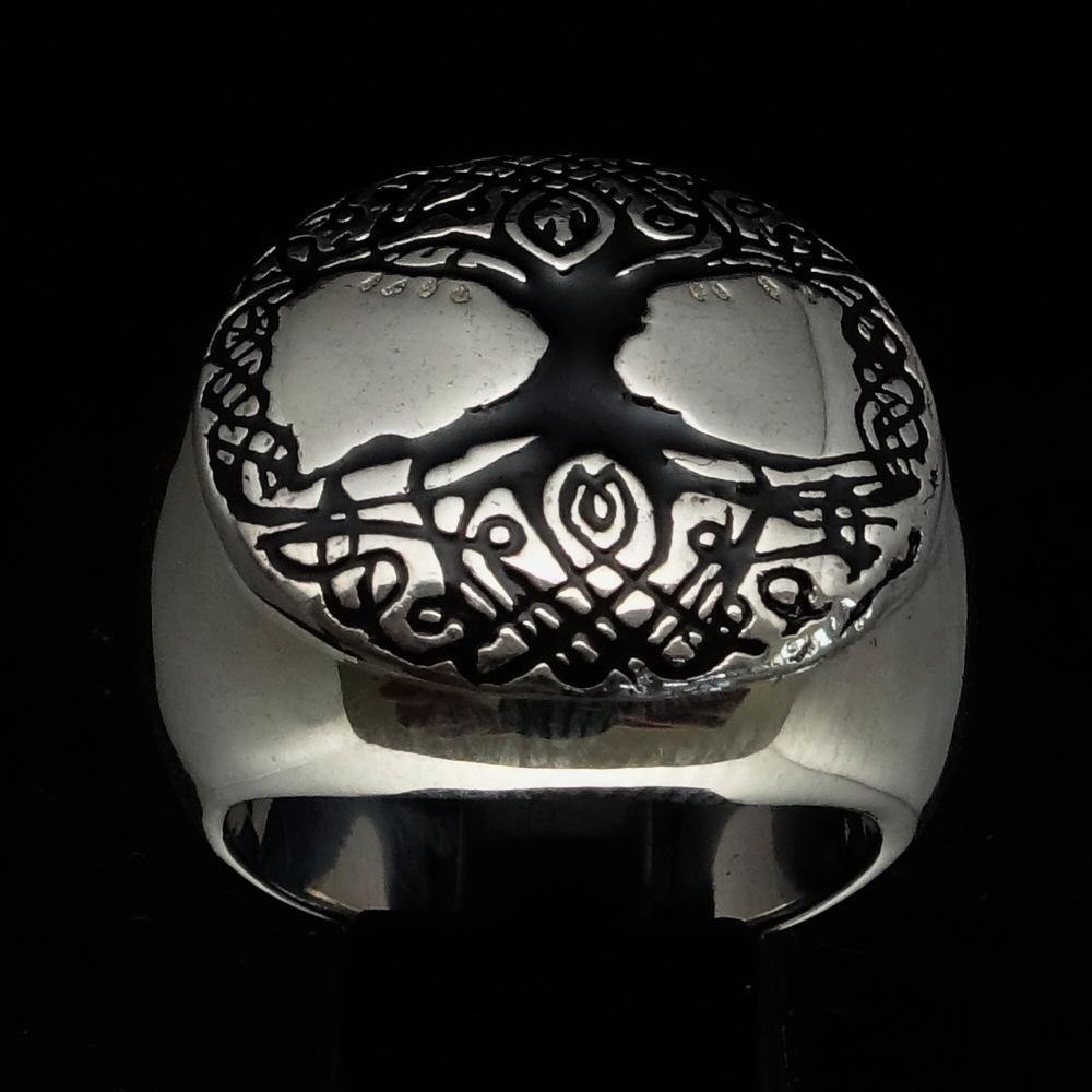 Men's black Tree of Life Ring made of solid sterling silver with high polish and enamel detailing, showcasing intricate design.