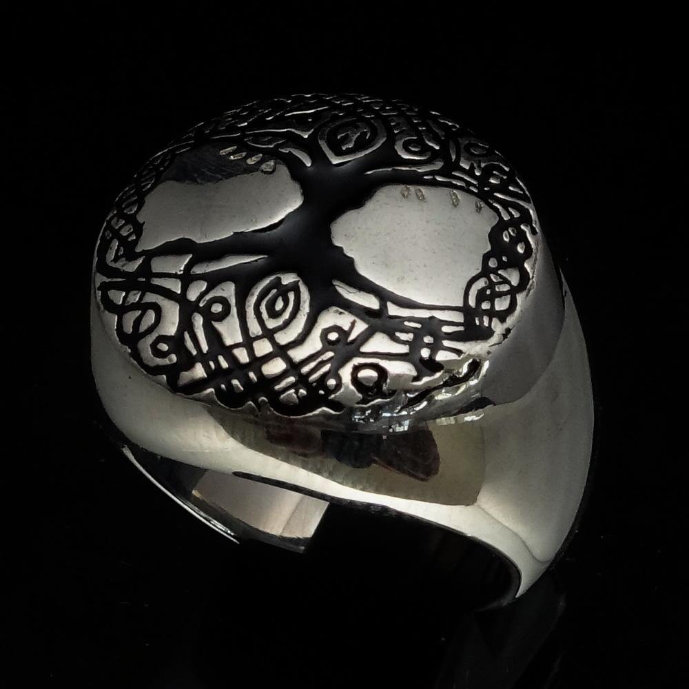 Men's black Tree of Life Ring made of solid sterling silver with high polish and enamel detailing, showcasing intricate design.