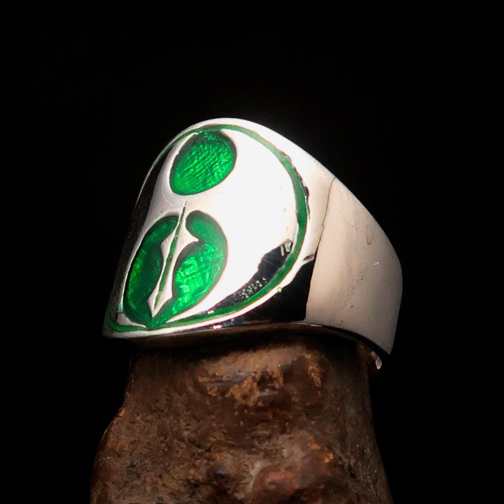 Men's green Labrys double Axe Ring made of solid sterling silver with high polish and enamel finish, showcasing intricate design.