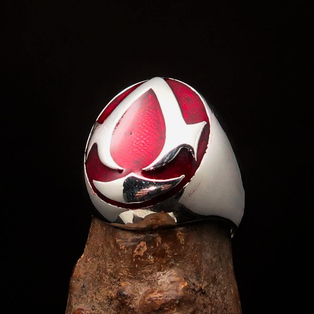 Men's red Assassin Ring made of solid Sterling Silver with high polish and vibrant red enamel finish, showcasing its intricate design.