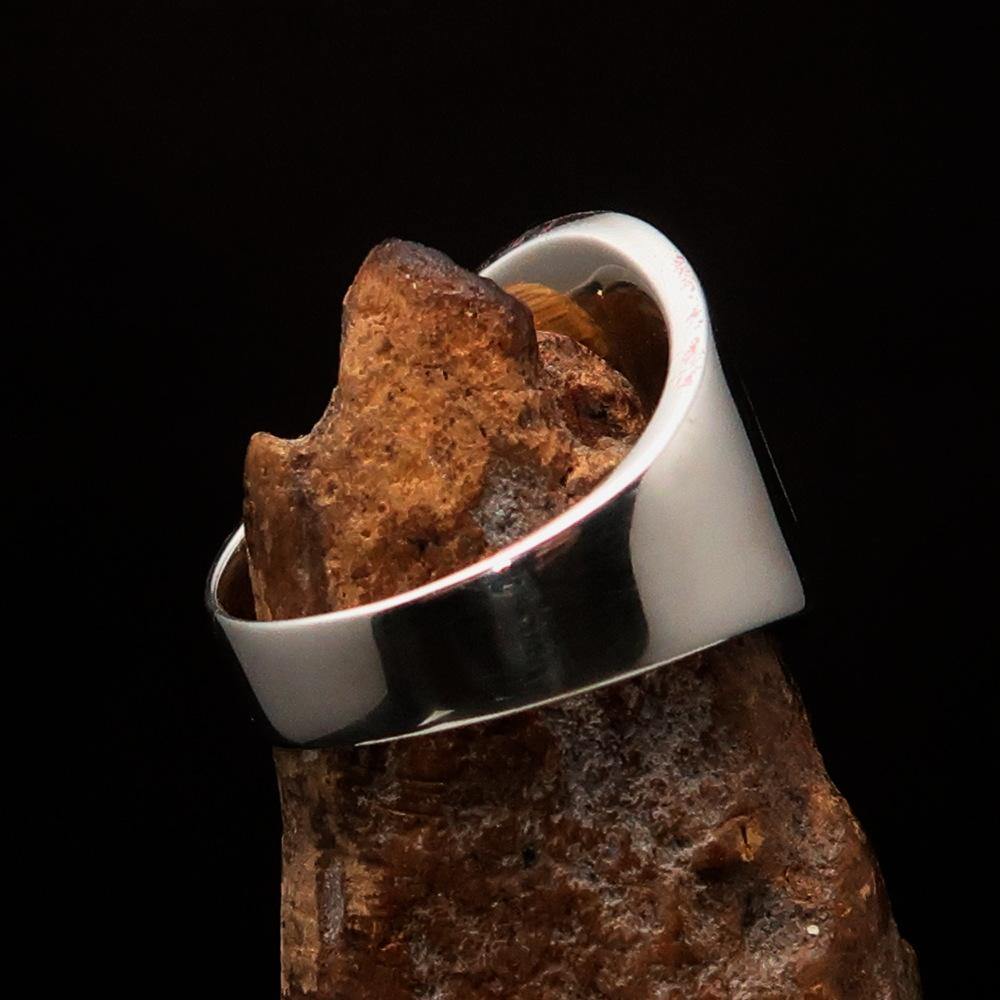 Men's Red Labrys Double Axe Ring made of solid sterling silver with high polish and red enamel detailing.