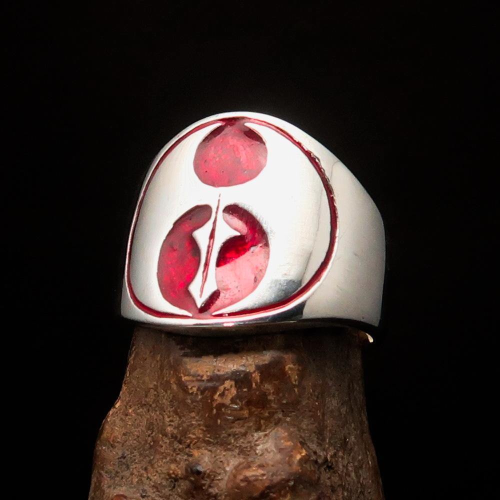 Men's Red Labrys Double Axe Ring made of solid sterling silver with high polish and red enamel detailing.