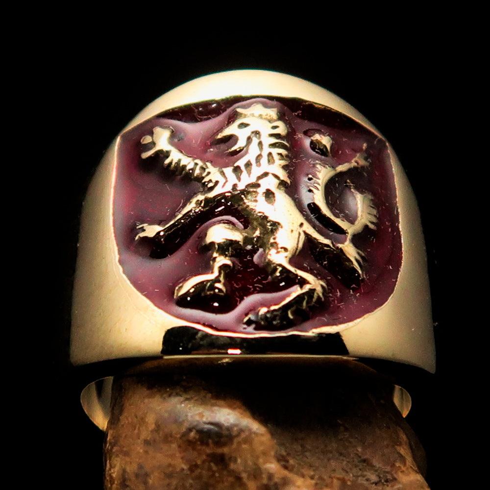 A beautifully crafted ancient men's ring featuring a red enamel rampant lion design, made from solid brass with a polished finish.