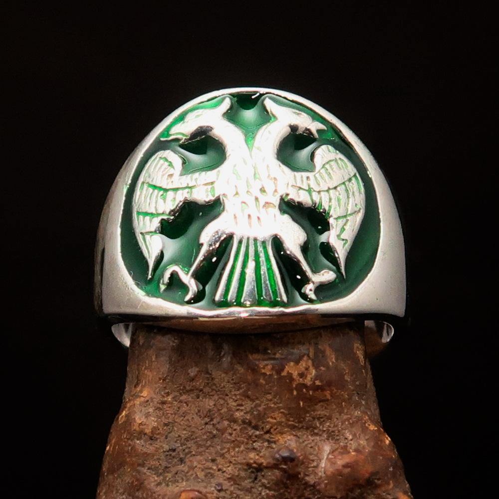 Men's Twin Head Eagle Ring in Sterling Silver with green enamel inlay, showcasing intricate ancient design and polished finish.