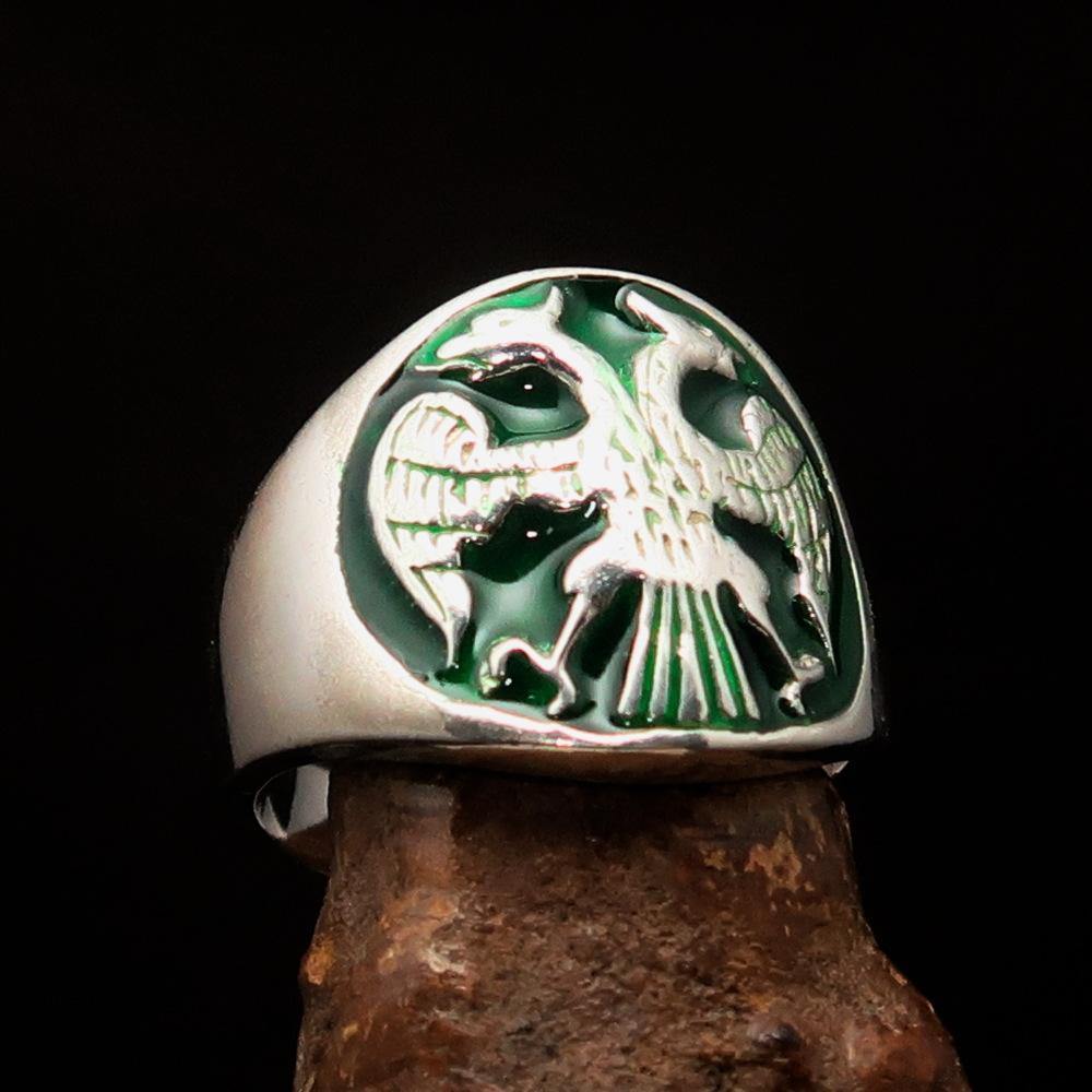 Men's Twin Head Eagle Ring in Sterling Silver with green enamel inlay, showcasing intricate ancient design and polished finish.