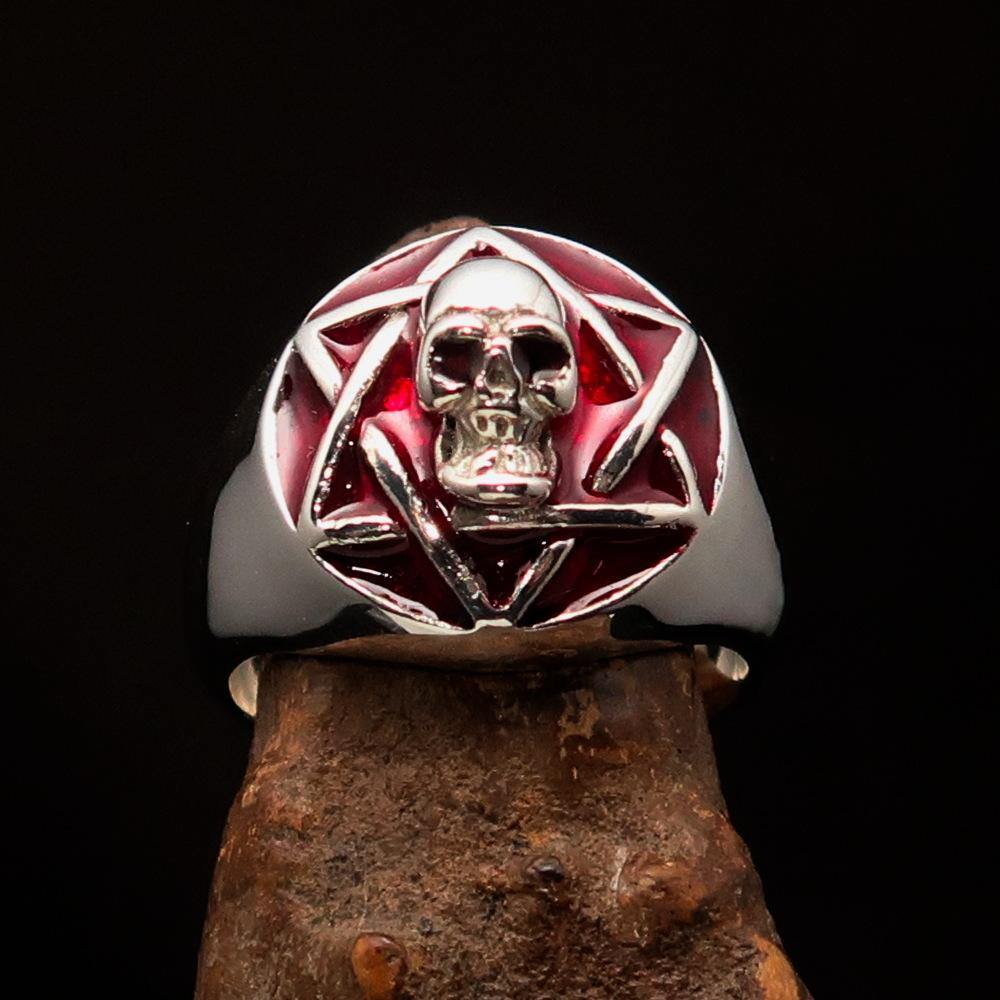 A beautifully crafted domed red Men's Hexagram Skull Ring made of solid sterling silver with a high-polished finish and red enamel.