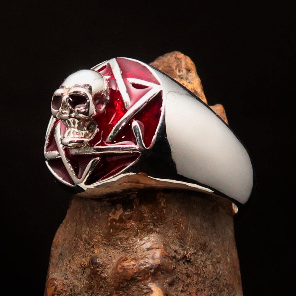 A beautifully crafted domed red Men's Hexagram Skull Ring made of solid sterling silver with a high-polished finish and red enamel.