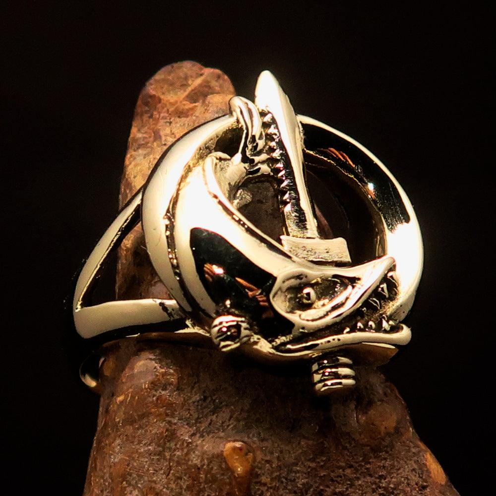 A beautifully crafted Fish and Sword Combat Diver Ring made of solid brass, showcasing intricate designs of fish and swords with a high polished finish.