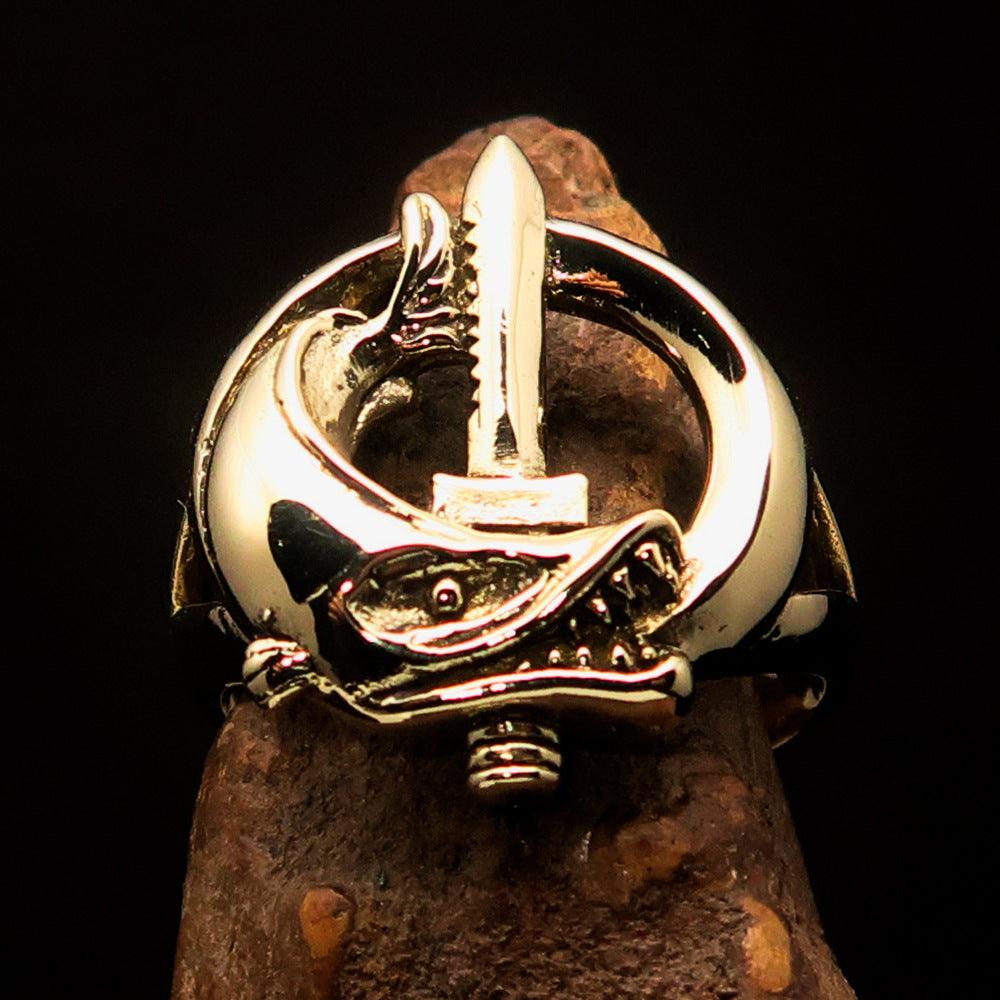 A beautifully crafted Fish and Sword Combat Diver Ring made of solid brass, showcasing intricate designs of fish and swords with a high polished finish.