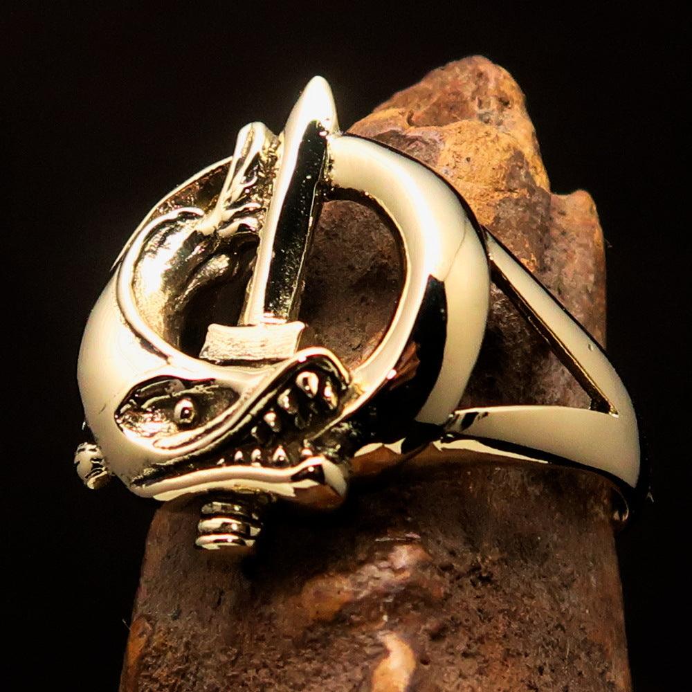 A beautifully crafted Fish and Sword Combat Diver Ring made of solid brass, showcasing intricate designs of fish and swords with a high polished finish.