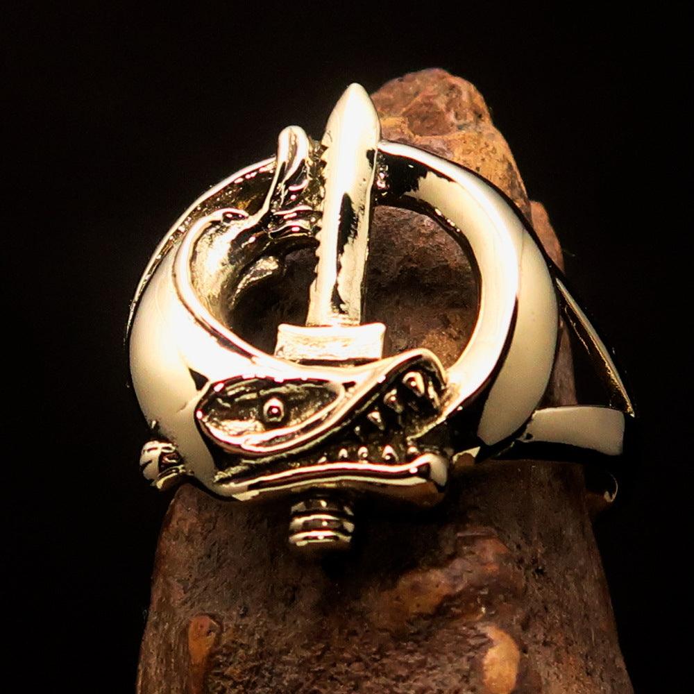 A beautifully crafted Fish and Sword Combat Diver Ring made of solid brass, showcasing intricate designs of fish and swords with a high polished finish.