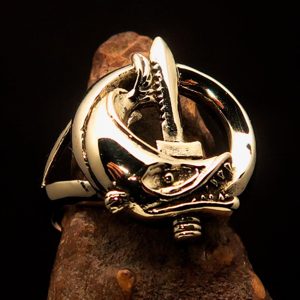 A beautifully crafted Fish and Sword Combat Diver Ring made of solid brass, showcasing intricate designs of fish and swords with a high polished finish.