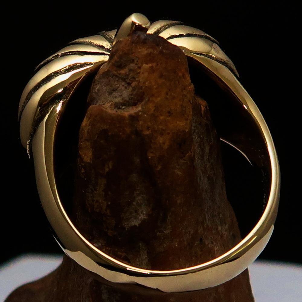 A beautifully crafted solid brass men's pumpkin ring with an antiqued and polished finish, showcasing intricate pumpkin design.