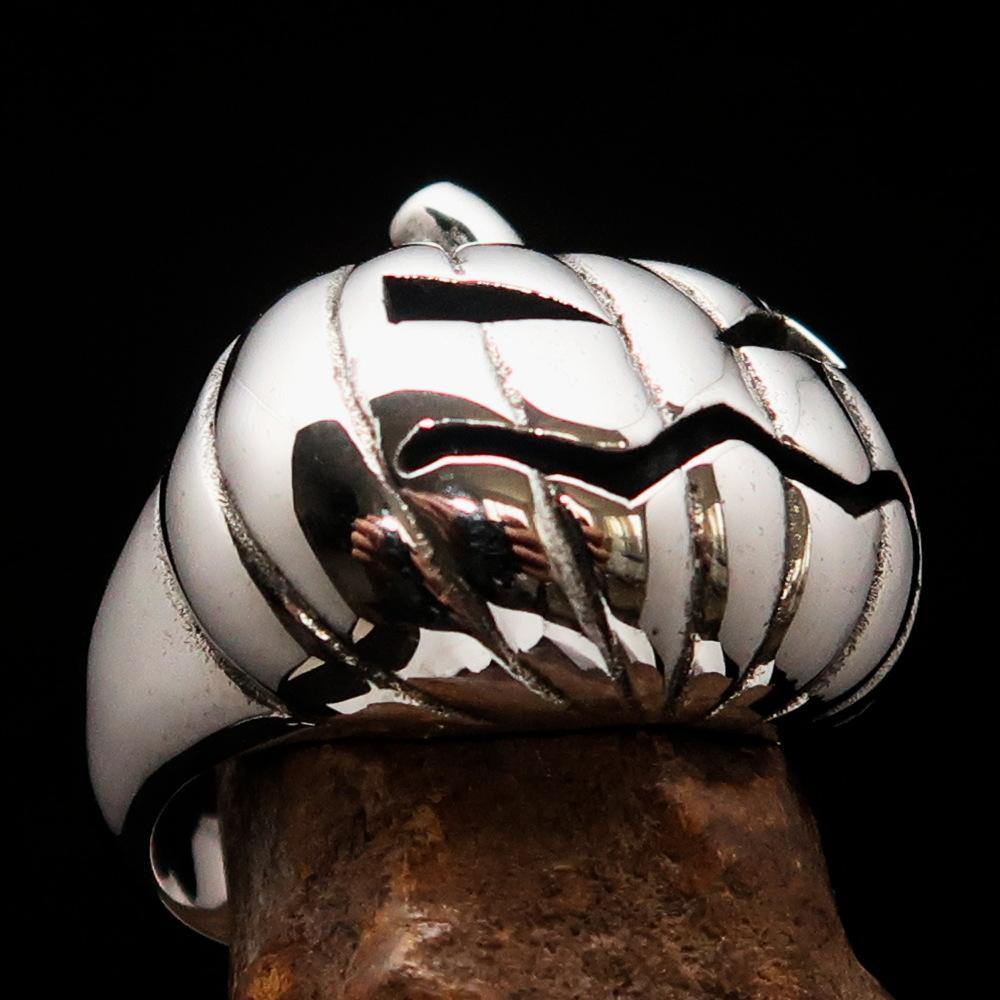 A beautifully crafted sterling silver pumpkin ring for men, featuring an antiqued and high polished finish, showcasing its unique design.