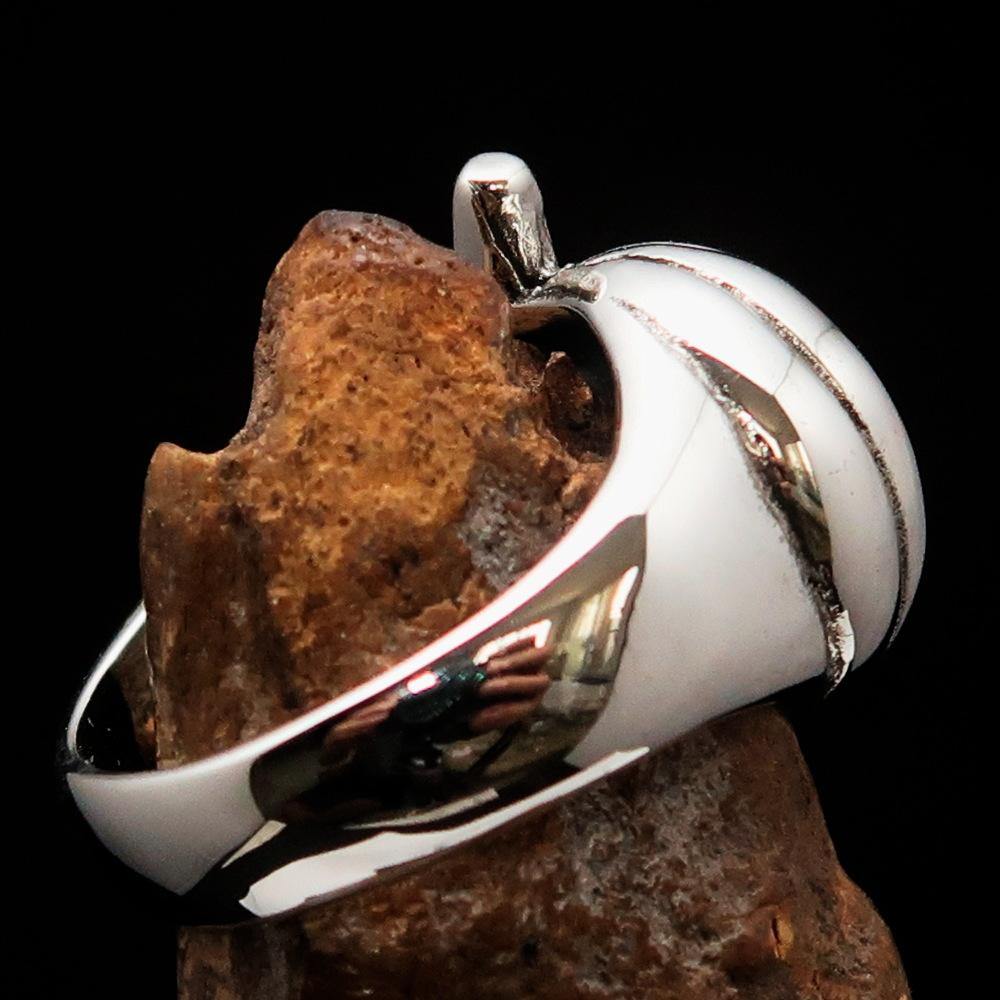 A beautifully crafted sterling silver pumpkin ring for men, featuring an antiqued and high polished finish, showcasing its unique design.