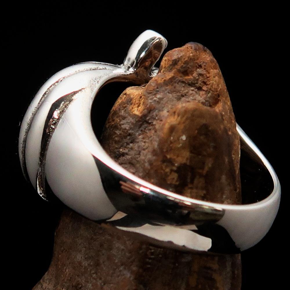 A beautifully crafted sterling silver pumpkin ring for men, featuring an antiqued and high polished finish, showcasing its unique design.