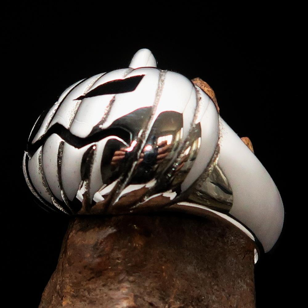 A beautifully crafted sterling silver pumpkin ring for men, featuring an antiqued and high polished finish, showcasing its unique design.