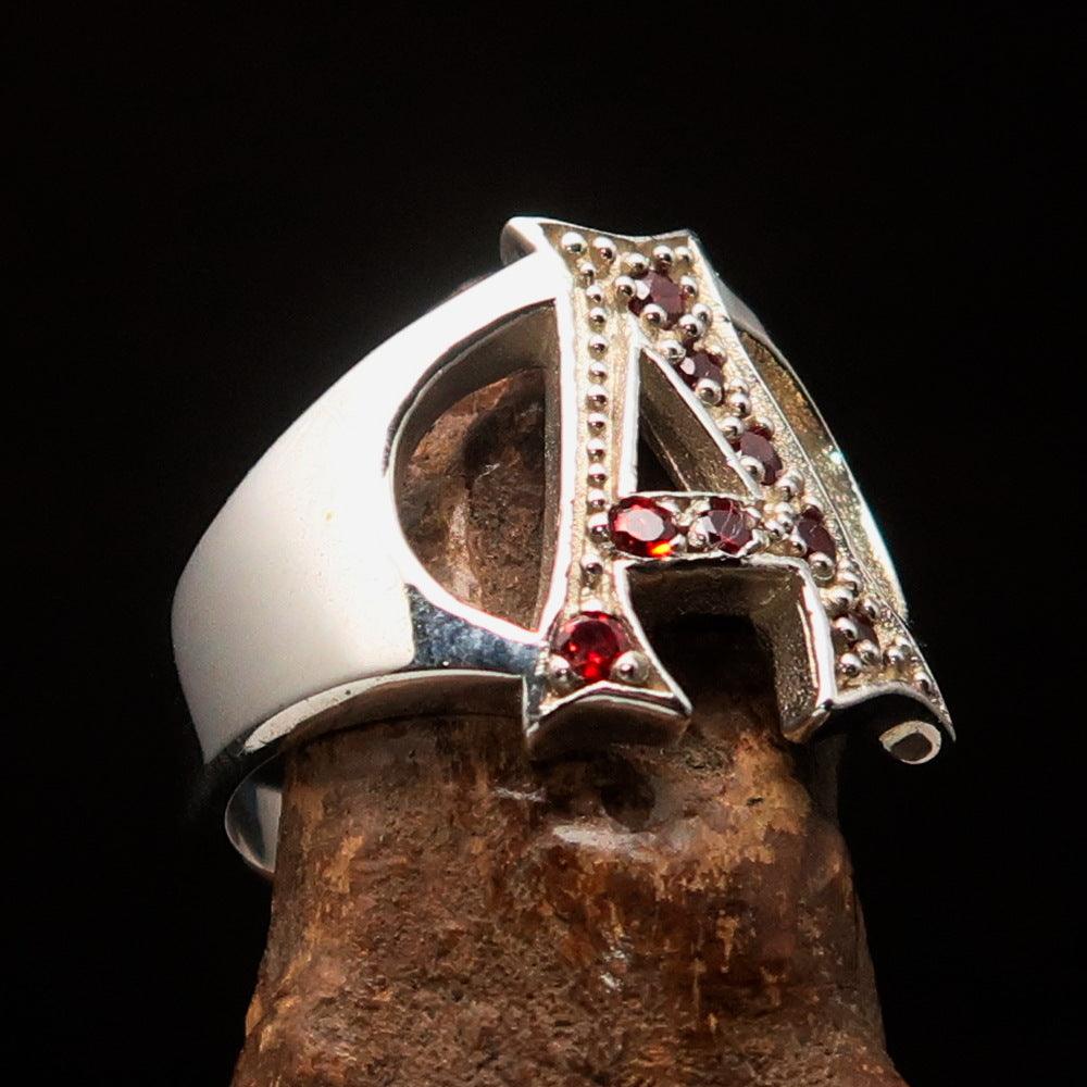 Excellent crafted Initial Ring featuring a bold letter A with 8 red Cubic Zirconias, made from solid Sterling Silver with a polished finish.