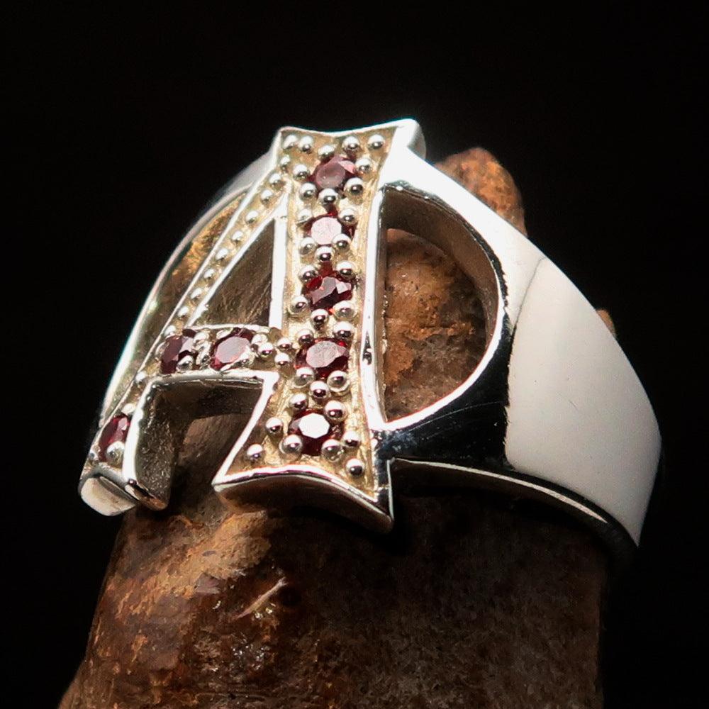 Excellent crafted Initial Ring featuring a bold letter A with 8 red Cubic Zirconias, made from solid Sterling Silver with a polished finish.