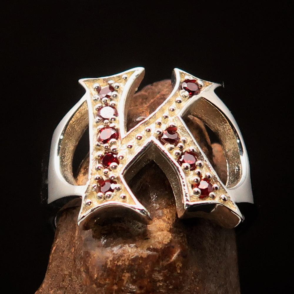 Excellent Crafted Initial Ring featuring a bold letter K adorned with 9 red cubic zirconias, made of high-quality sterling silver.