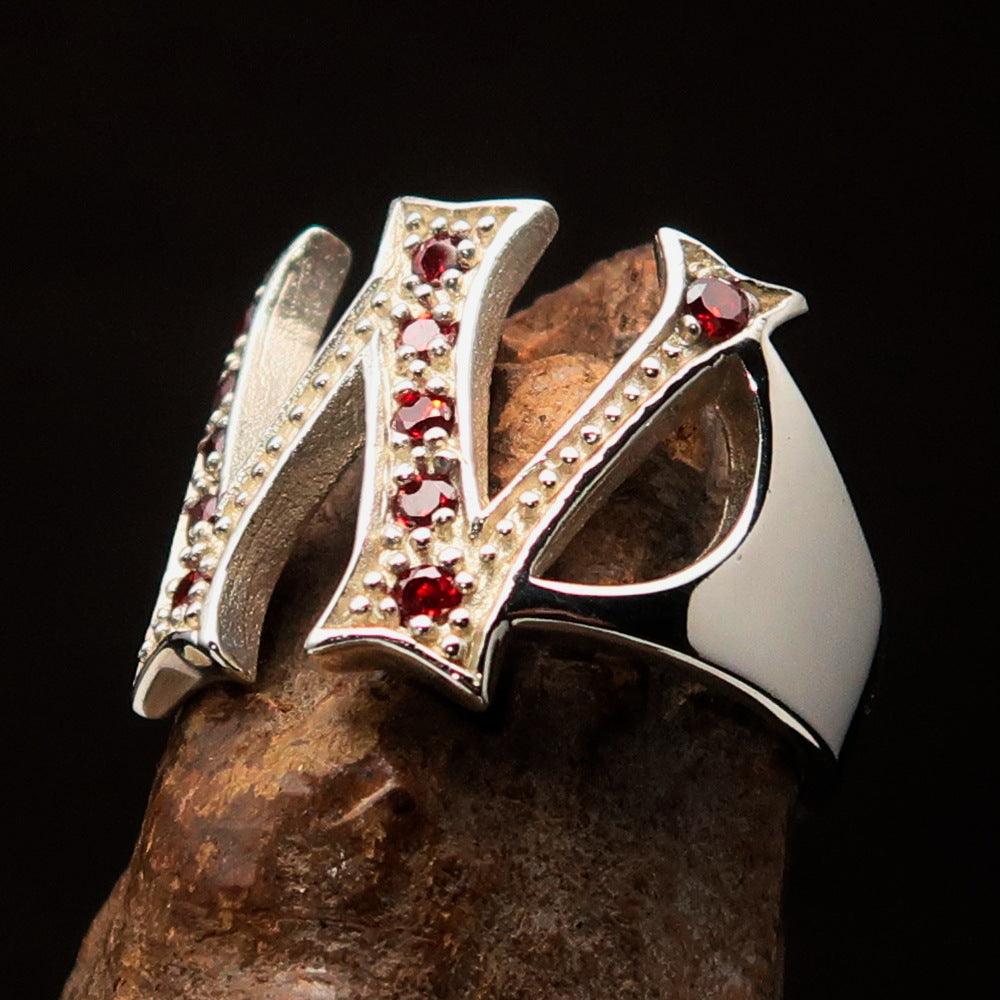 Excellent Crafted Initial Ring featuring a bold letter W adorned with 11 red cubic zirconias, made of sterling silver.