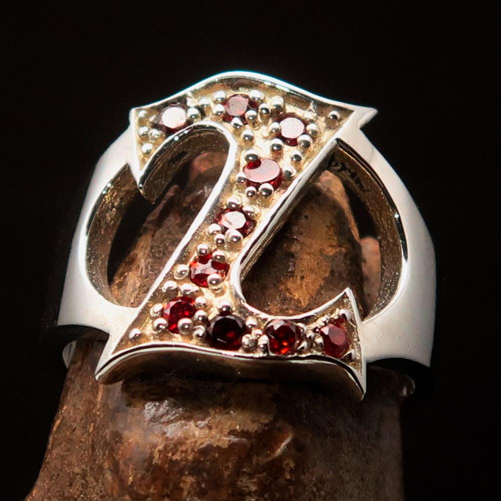 Excellent Crafted Initial Ring featuring a bold letter Z design adorned with 10 red cubic zirconias, made from sterling silver.